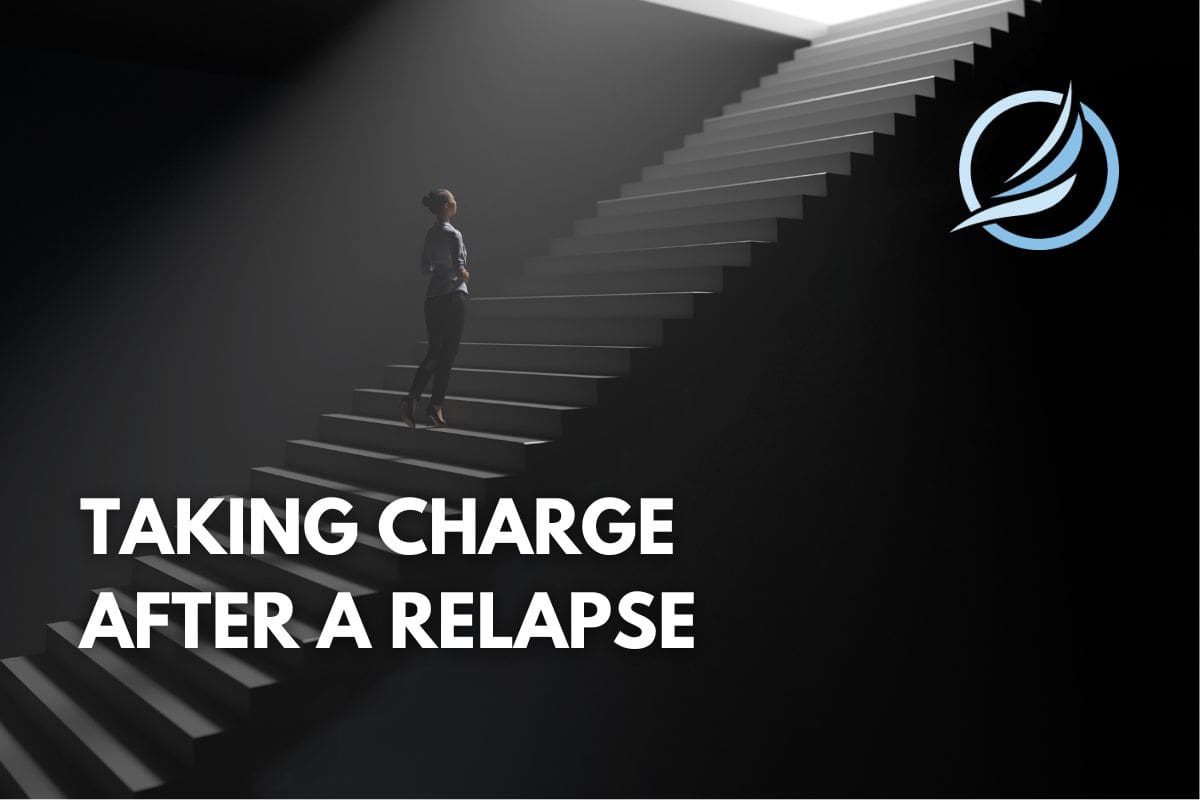 Someone climbing a set of stairs, representing the effort and progress involved in overcoming a relapse and continuing the journey towards sobriety. Steps to recover from relapse.