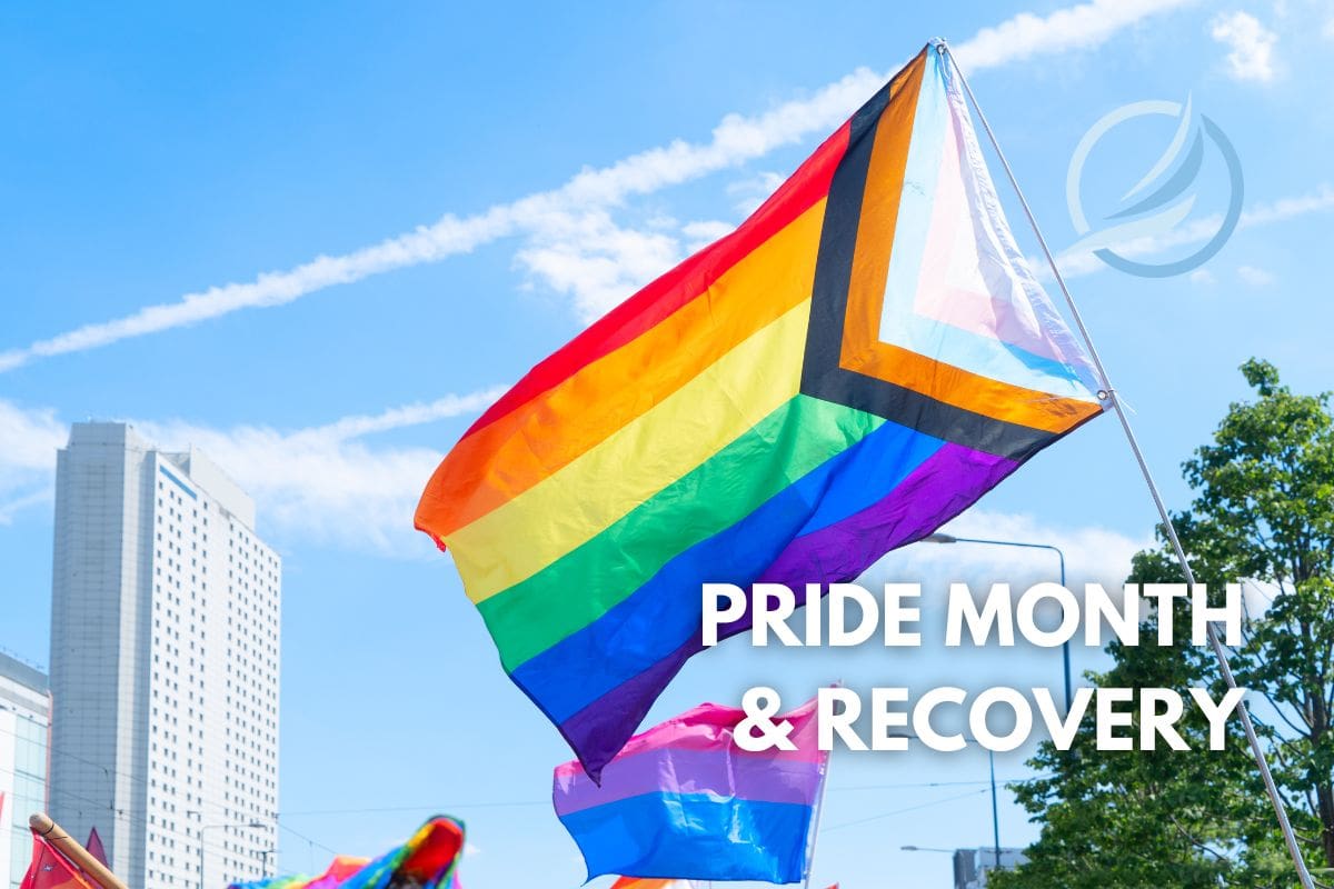 an image of pride flags celebrating pride month in june and how to celebrate recovery in a safe and positive manner. pride month and recovery.
